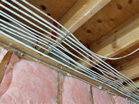 attaching junction boxes to rafters|electrical wiring across rafters.